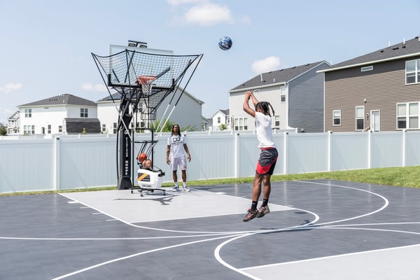 Parent Shooting Baskets